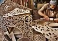 Wood Carving Exports Halted By War
