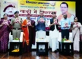 धामी ने पूर्व डीजीपी अनिल रतूड़ी की पुस्तक का किया विमोचन